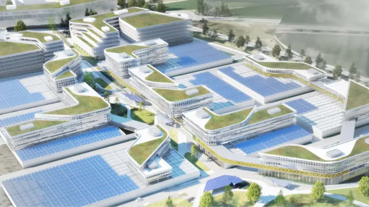Moderne Gebäude mit begrünten Dächern und Solaranlagen prägen diesen urbanen Lebensraum.