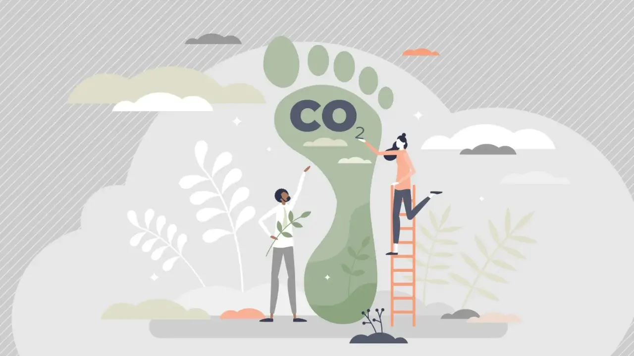 Zwei Menschen arbeiten an einem riesigen CO2-Fußabdruck, um klimaneutral leben zu können.