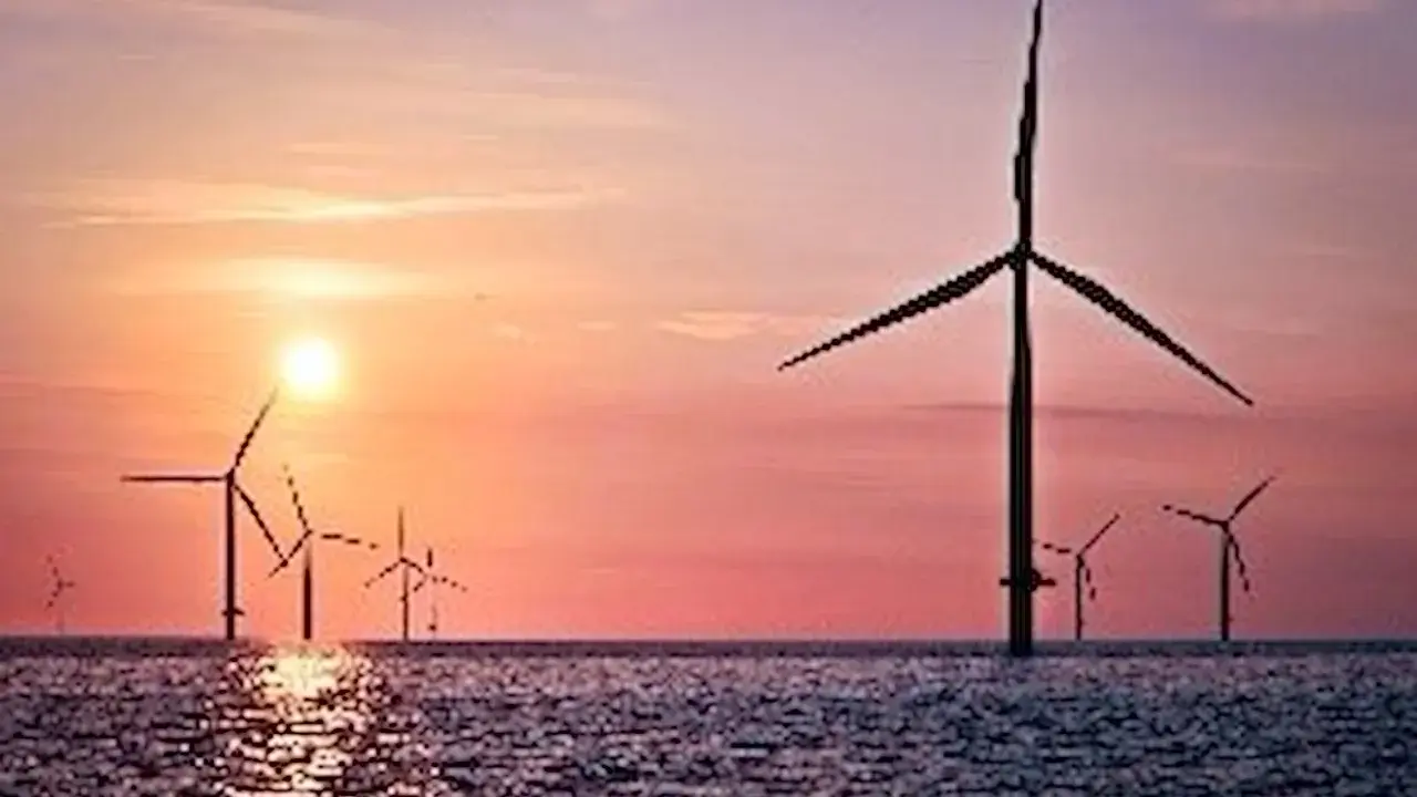 Windräder im Meer bei Sonnenuntergang. Ein Symbol für die EEG Umlage Befreiung und eine saubere Zukunft.