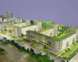 Modell einer integrierten Stadtentwicklung mit begrünten Dächern, Wohnblöcken und Bäumen.