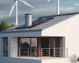 Ein modernes Einfamilienhaus mit Solarpaneelen und einer Kleinwindkraftanlage im Hintergrund, die für nachhaltige Energie sorgt.