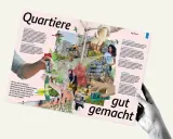 Quartiersentwicklung: Eine Hand hält ein Smartphone, das eine grüne Stadt mit Drohnen und einem Windrad zeigt.