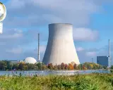 Kühlturm eines Kernkraftwerks am Seeufer, ein Symbol für die Debatte um die Atomkraft Zukunft.
