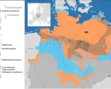 Karte zeigt Lithium-Vorkommen in Deutschland, mit Fokus auf Geothermie. Orange und blaue Flächen markieren Formationen, grüne Punkte zeigen hohe Lithiumkonzentrationen.